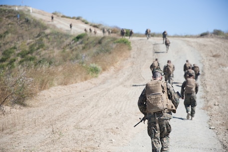 U.S. Marines with Combat Logistics Battalion 5, Combat Logistics Regiment 1, 1st Marine Logistics Group participate in a six mile conditioning hike on Camp Pendleton, Calif., June 16, 2017. The Marines have four conditioning hikes to prepare for Mountain Exercise 4-17 which will be conducted on the Marine Corps Mountain Warfare Training Center in Bridgeport, Calif. (U.S. Marine Corps photo by Lance Cpl. Timothy Shoemaker)