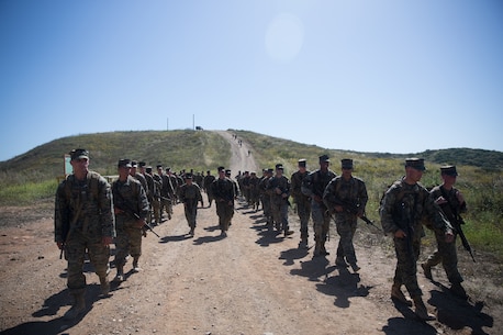 U.S. Marines with Combat Logistics Battalion 5, Combat Logistics Regiment 1, 1st Marine Logistics Group participate in a six mile conditioning hike on Camp Pendleton, Calif., June 16, 2017. The Marines have four conditioning hikes to prepare for Mountain Exercise 4-17 which will be conducted on the Marine Corps Mountain Warfare Training Center in Bridgeport, Calif. (U.S. Marine Corps photo by Lance Cpl. Timothy Shoemaker)