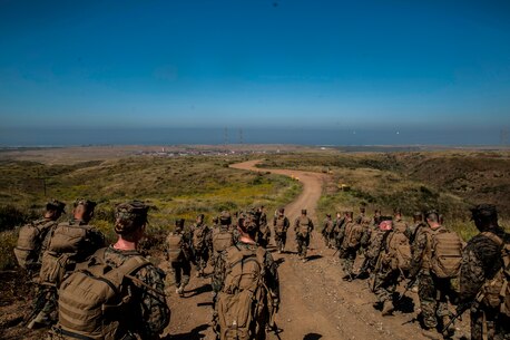 U.S. Marines with Combat Logistics Battalion 5, Combat Logistics Regiment 1, 1st Marine Logistics Group participates in a six mile conditioning hike on Camp Pendleton, Calif., June 16, 2017. The Marines have four conditioning hikes to prepare for Mountain Exercise 4-17 which will be conducted on the Marine Corps Mountain Warfare Training Center in Bridgeport, Calif. (U.S. Marine Corps photo by Lance Cpl. Adam Dublinske)