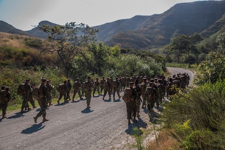 U.S. Marines with Combat Logistics Battalion 5, Combat Logistics Regiment 1, 1st Marine Logistics Group participates in a six mile conditioning hike on Camp Pendleton, Calif., June 16, 2017. The Marines have four conditioning hikes to prepare for Mountain Exercise 4-17 which will be conducted on the Marine Corps Mountain Warfare Training Center in Bridgeport, Calif. (U.S. Marine Corps photo by Lance Cpl. Adam Dublinske)