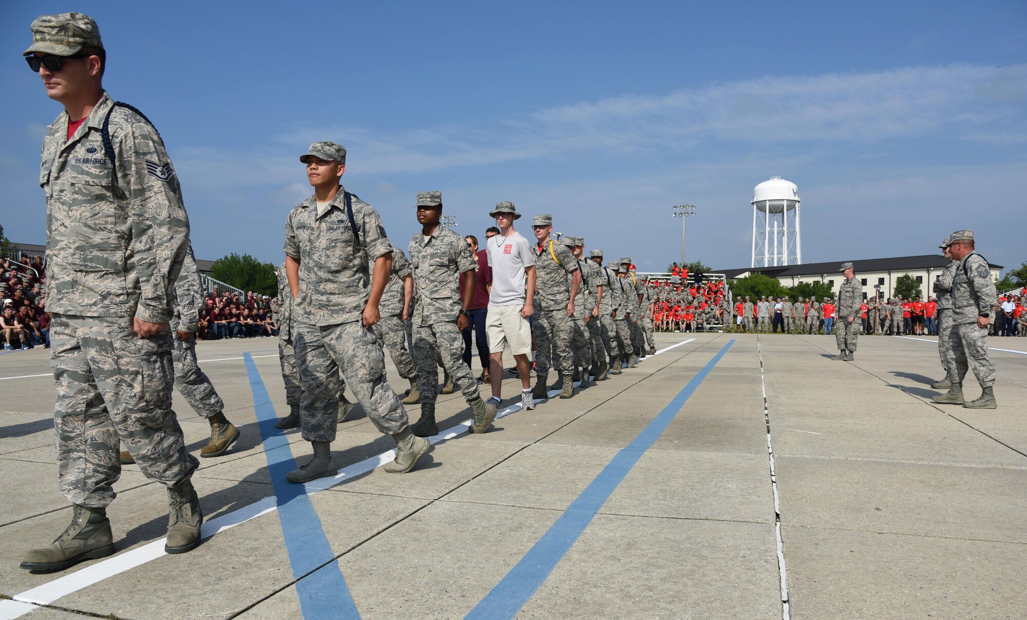 Students and military training leaders from the 81st Training Group participate in a round of “knock out” during the 81st TRG drill down on the Levitow Training Support Facility drill pad June 16, 2017, on Keesler Air Force Base, Miss. Airmen from the 81st TRG competed in a quarterly open ranks inspection, regulation drill routine and freestyle drill routine. The 334th TRS “Gators” took first place this quarter. (U.S. Air Force photo by Kemberly Groue)