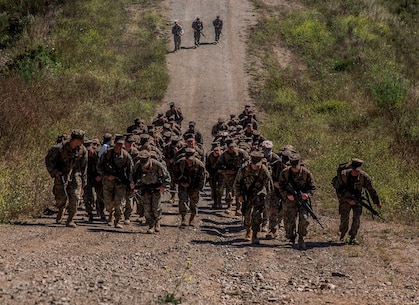 U.S. Marines with Combat Logistics Battalion 5, Combat Logistics Regiment 1, 1st Marine Logistics Group participates in a six mile conditioning hike on Camp Pendleton, Calif., June 16, 2017. The Marines have four conditioning hikes to prepare for Mountain Exercise 4-17 which will be conducted on the Marine Corps Mountain Warfare Training Center in Bridgeport, Calif. (U.S. Marine Corps photo by Lance Cpl. Adam Dublinske)