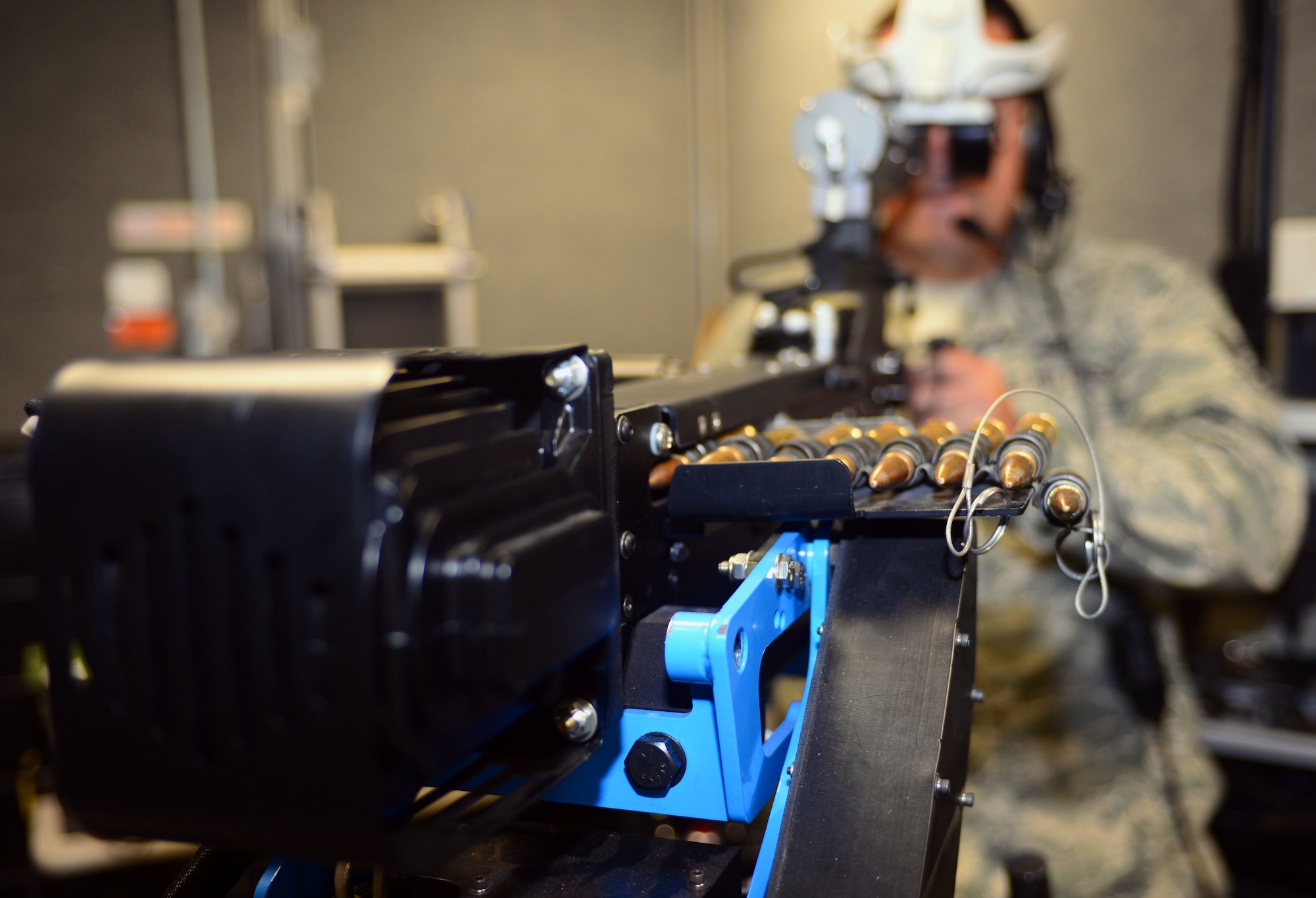 U.S. Air Force Tech. Sgt. Clint Lykken, the noncommissioned officer in charge of electrical operations assigned to the 28th Civil Engineer Squadron, Ellsworth Air Force Base, S.D., takes hold of the gunner position in the virtual convoy at Camp Rapid, S.D., June 15, 2017. Military personnel who deploy to contingency operations take advantage of the high-tech simulator to hone their convoy skills in a challenging but safe environment. (U.S. Air Force photo by Airman 1st Class Donald C. Knechtel)