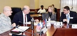 Cathy Contreras, Defense Logistics Agency Aviation’s acquisition executive and head of contracting agency, discusses acquisition policies with Matthew Beebe, DLA Headquarters Acquisitions director, former DLA Aviation Commander Air Force Brig. Gen. Allan Day, and Miquel Zayas, far right, supervisory procurement analyst, DLA Headquarters Acquisitions, March 10, 2017 during an Agency Management Review March 6 – 10, 2017 at Defense Supply Center Richmond, Virginia. 