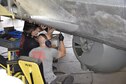DAYTON, Ohio (06/2017) -- (From left to right) Restoration Specialists Jason Davis and Chase Meredith work on the B-17F &quot;Memphis Belle&quot;™ in the restoration hangar at the National Museum of the U.S. Air Force. The exhibit opening for this aircraft is planned for May 17, 2018.(U.S. Air Force photo by Ken LaRock) 
