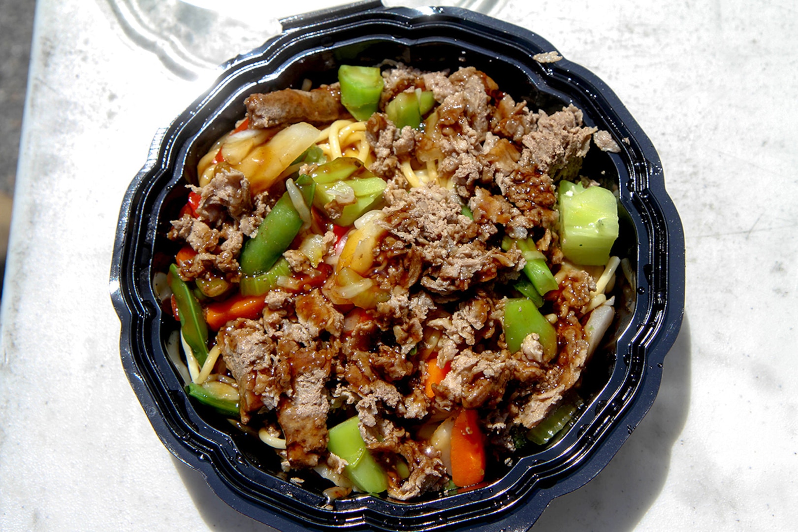 This Asian-style meal is one of the dishes available from the Outpost food truck on Fort Stewart, Georgia. Other options include a bacon burger, wrap, sub or a hearty scratch salad with your choice of meat.
