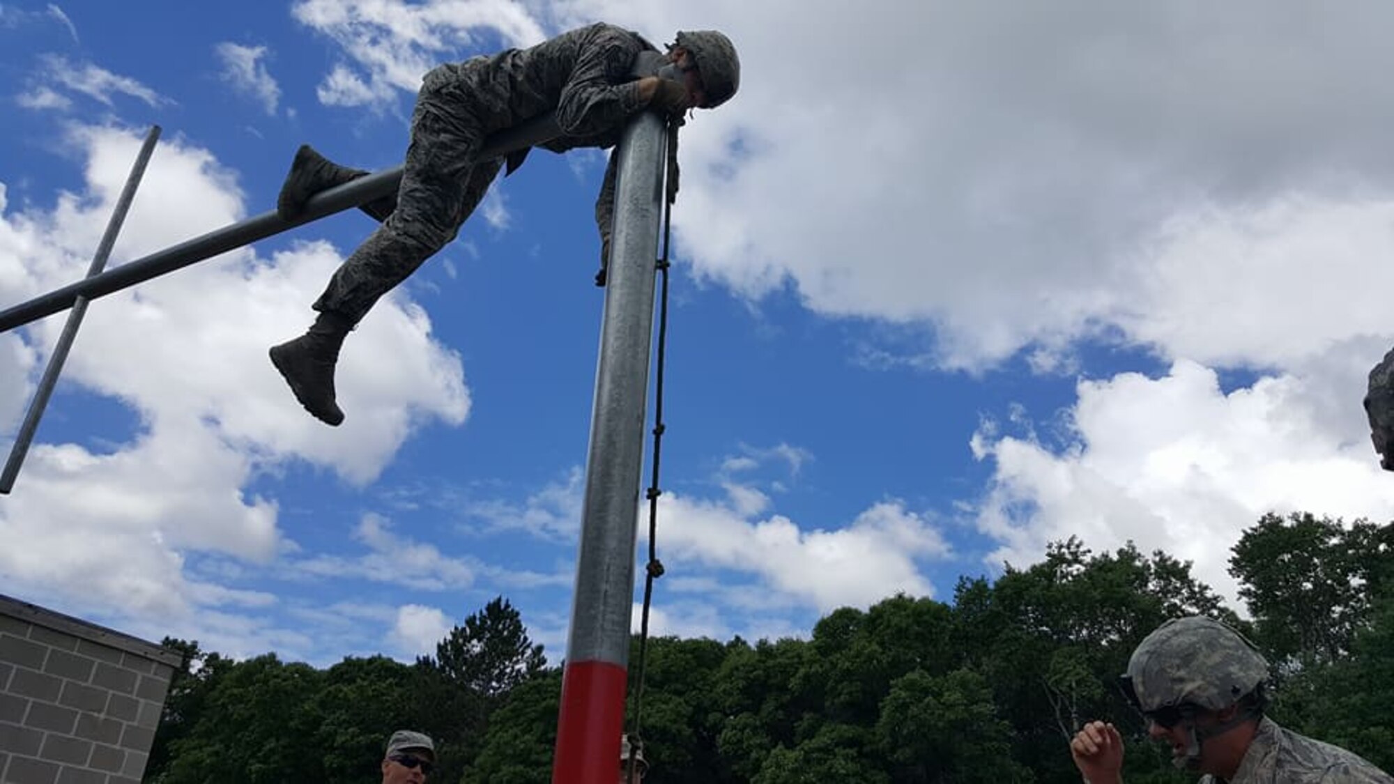 Members of the 934th Security Forces Squadron negotiate the Leadership Reaction Course at Camp Ripley, Minn. June 19 as part of their annual training. (Photo courtesy of Camp Ripley)