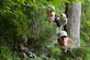 U.S. Air Force Staff Sgt. Matthew Milavickas, left, 633rd Civil Engineer Squadron pavement and construction equipment craftsman, and Tech. Sgt. Matthew Lawrence, 633rd Civil Engineer Squadron NCO of explosive ordnance device training, search for a designated location during a Prime Base Engineer Emergency Force land navigation training at Joint Base Langley-Eustis, Va., June 15, 2017. The 633rd CES Airmen perform Prime BEEF training every month to establish and maintain deployment readiness. (U.S. Air Force photo/Airman 1st Class Kaylee Dubois)