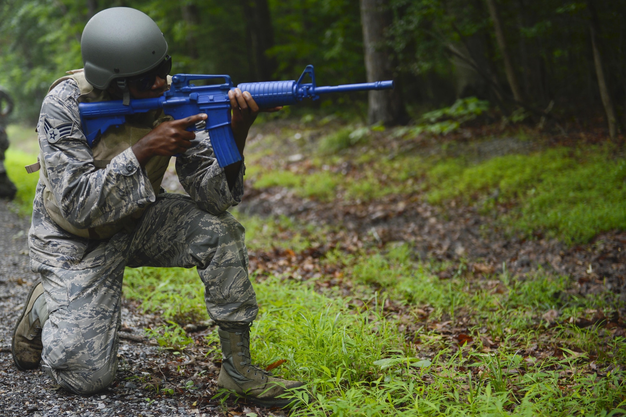 U.S. Air Force Senior Airman Patrick Marvel, 633rd Civil Engineer Squadron pavement and construction equipment craftsman, protects his sector during a Prime Base Engineer Emergency Force convoy training at Joint Base Langley-Eustis, Va., June 15, 2017. The 633rd CES Airmen are required to establish, operate and maintain a wide variety of engineering skills to support state-side and deployed locations. (U.S. Air Force photo/Airman 1st Class Kaylee Dubois)