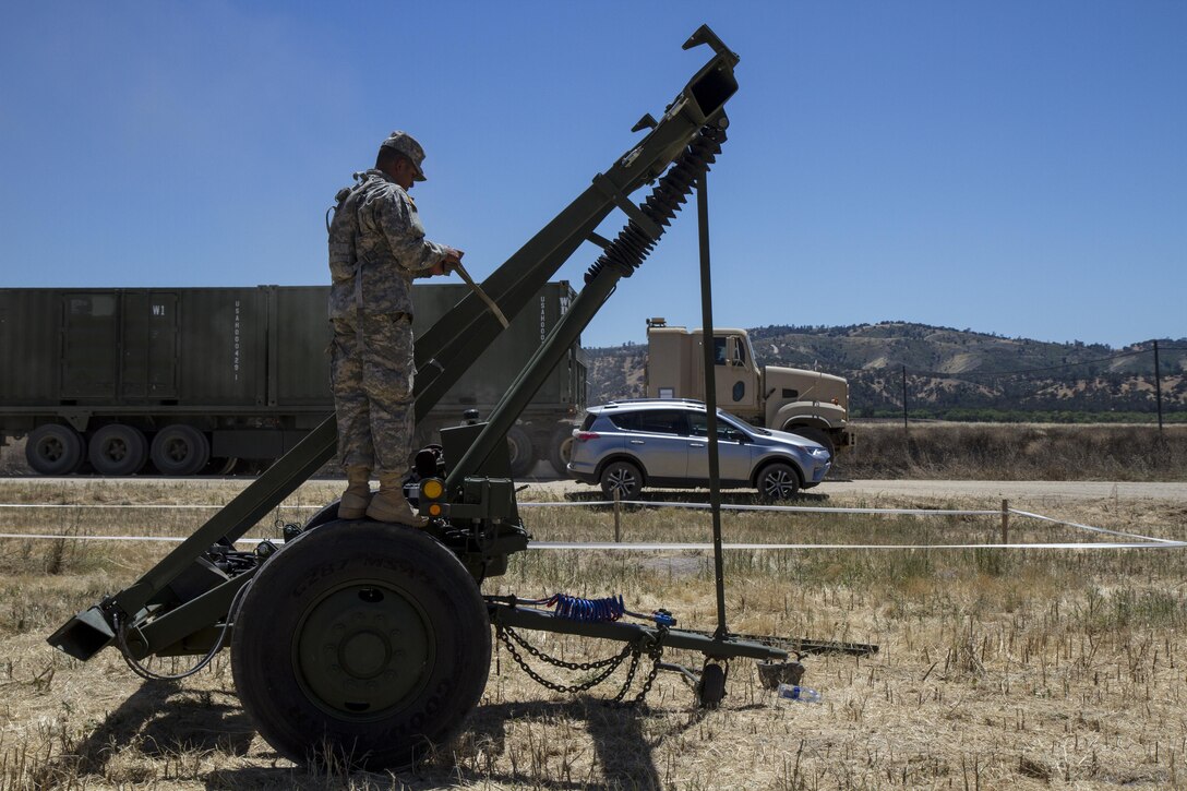 U.S. Army Spc. Jonas Leal, 114th MCD prepares a dolley to retrieve another conex box to be moved to another Tactical Assembly Area (TAA) during the Warrior Exercises (WAREX) on Fort Hunter Liggett, Calif. on June 13, 2017. More than 3000 U.S. Army Reserve Soldiers are participating in the 91st Training Division’s Warrior Exercise (WAREX) 91-17-03 at Fort Hunter Liggett, Calif.; The WAREX is a large scale collective training platform to generate capable, lethal, and combat ready forces. (U.S. Army photo by Spc. Sean McCallon, 91st Training Division public affairs/Released)