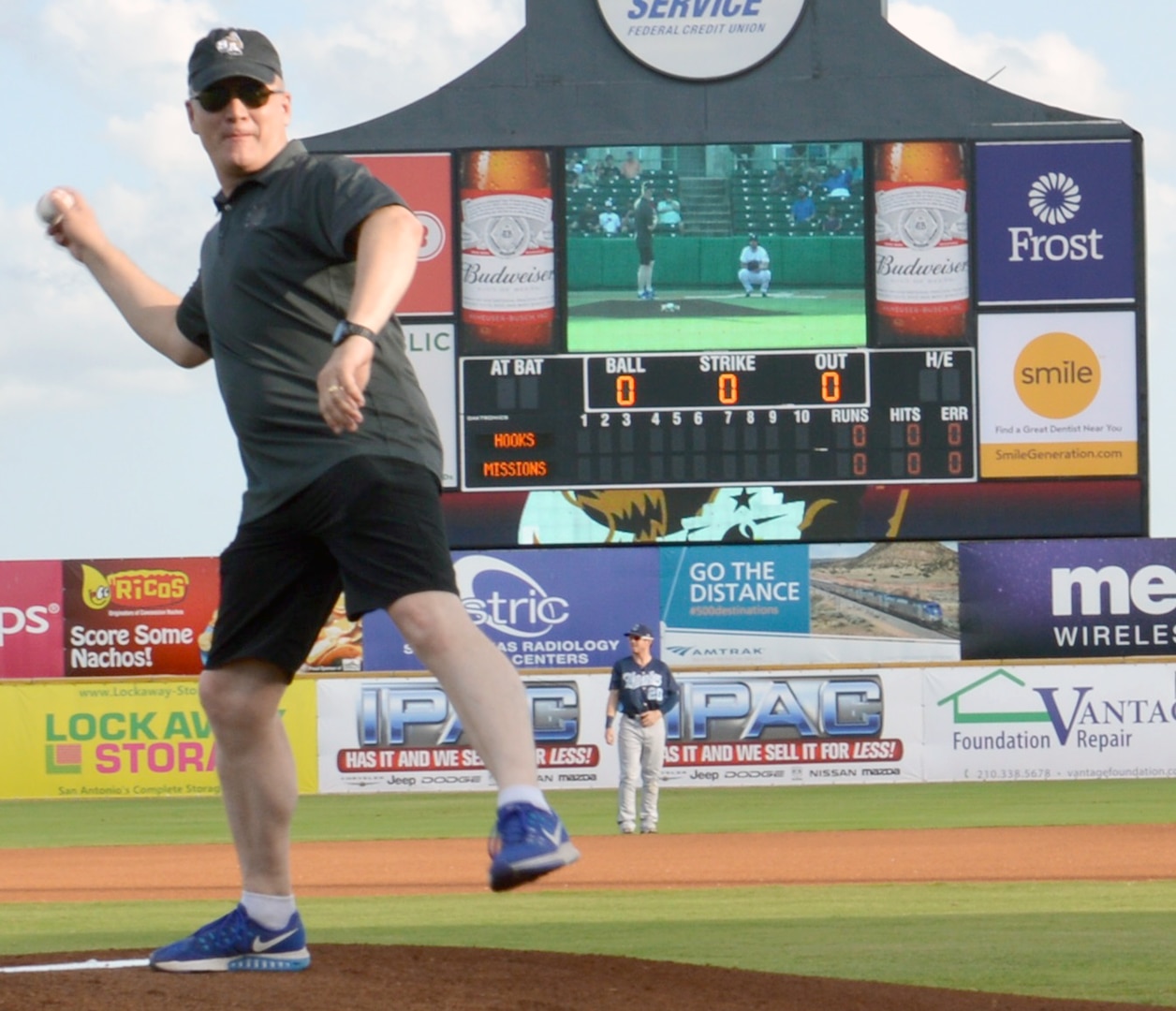 Col. James C. Royse, commander of the 470th Military Intelligence Brigade at Joint Base San Antonio-Fort Sam Houston, threw out the ceremonial first pitch prior to the San Antonio Missions vs. Corpus Christi baseball game at Wolff Stadium in San Antonio June 13.