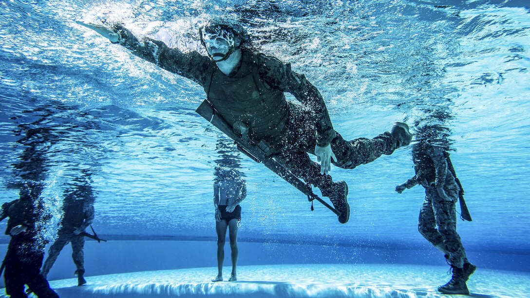 A Marine participates in an advanced water survival course on Camp Pendleton, Calif., June 14, 2017. The course focused on strengthening individual Marine self-preservation and rescue skills in water. Marine Corps photo by Sgt. Rodion Zabolotniy