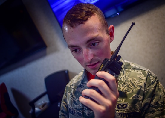 U.S. Air Force Airman 1st Class Kevin O’Hara II, 71st Fighter Training Squadron aviation resource manager journeyman, responds to an airfield radio transmission at Joint Base Langley-Eustis, Va., June 16, 2017. Squadron aviation resource managers coordinate with several agencies including maintenance, weather and base operations personnel to ensure a smooth transition from the ground to the air and vice versa. (U.S. Air Force photo/Staff Sgt. Areca T. Bell)