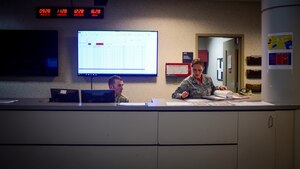 U.S. Air Force Airman 1st Class Kevin O’Hara II, 71st Fighter Training Squadron aviation resource manager journeyman, and Tech. Sgt. Erica Mathiesen, 71st Fighter Training Squadron aviation resource manager NCO in charge, prepare for an upcoming flight transmission at Joint Base Langley-Eustis, Va., June 16, 2017. As SARMs, O’Hara and Mathiesen track 71st FTS pilots’ training to ensure they are legally qualified to fly. (U.S. Air Force photo/Staff Sgt. Areca T. Bell)