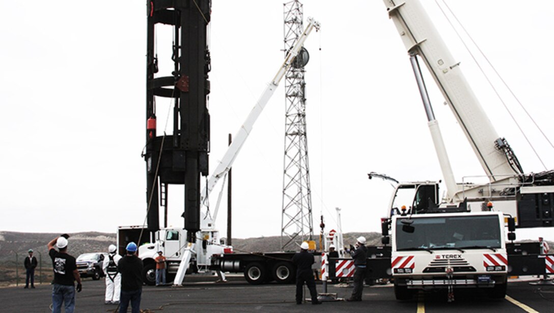 A Missile Suspension System is hoisted out of a silo to be refurbished. (Courtesy photo)
