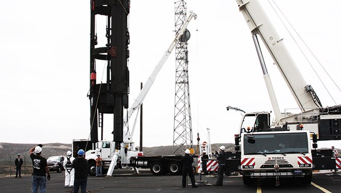 A Missile Suspension System is hoisted out of a silo to be refurbished. (Courtesy photo)