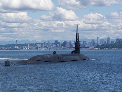 The ballistic-missile submarine USS Nebraska passes by Seattle during sea trials after completing an extended major maintenance period, to include an engineered refueling overhaul at Puget Sound Naval Shipyard and Intermediate Maintenance Facility. Navy photo by Seaman Joseph W. Weiser