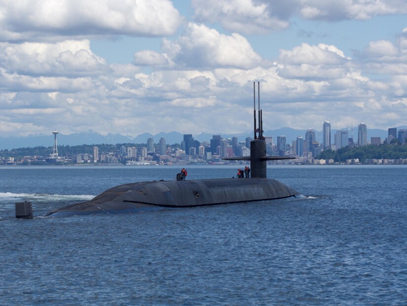 The ballistic-missile submarine USS Nebraska passes by Seattle during sea trials after completing an extended major maintenance period, to include an engineered refueling overhaul at Puget Sound Naval Shipyard and Intermediate Maintenance Facility. Navy photo by Seaman Joseph W. Weiser