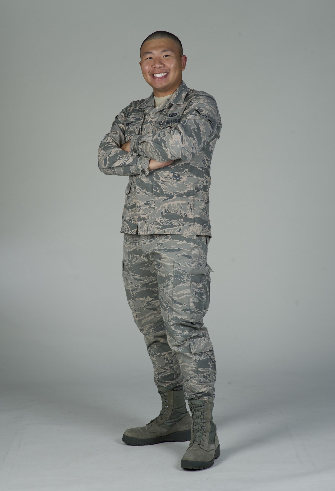 Airman Wang Zhe, 60th Comptroller Squadron, poses for a photo at Travis Air Force Base, Calif., June 20, 2017. Wang is from Kaifeng, China and joined the U.S. Air Force in September 2016. (U.S. Air Force Photo by Heide Couch)