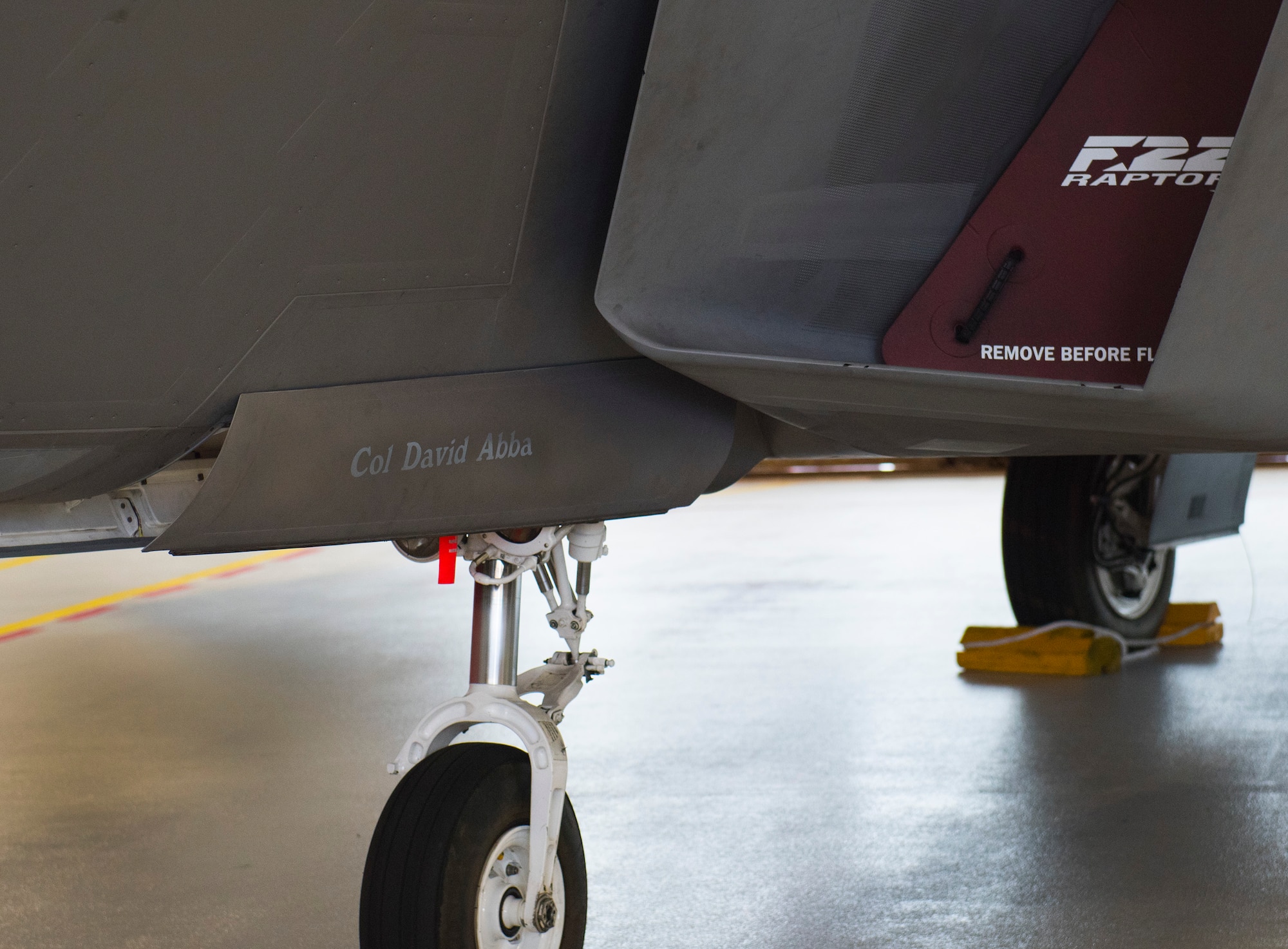 The wing flagship, the F-22 displays the new 53rd Wing commander’s name, Col. David Abba, during the change of command ceremony June 20 at Eglin Air Force Base, Fla. The Raptor is assigned to the 422nd Test and Evaluation Squadron at Nellis AFB, Nev., one of the wing's 22 geographically-separated units. (U.S. Air Force photo by Ilka Cole).



