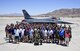 Current and former pilots from the United States Air Force Weapons School F-16 Fighting Falcon division pose for a group picture in front of an F-16 June 15, 2017, at Nellis Air Force Base,Nev. THe pilots celebrated the division's 35th Anniversary with a reunion of members from the first pilots in the division 35 years ago to pilots currently assigned to the 16th Weapons Squadron. (U.S. Air Force photo by Airman 1st Class Andrew D. Sarver/Released)