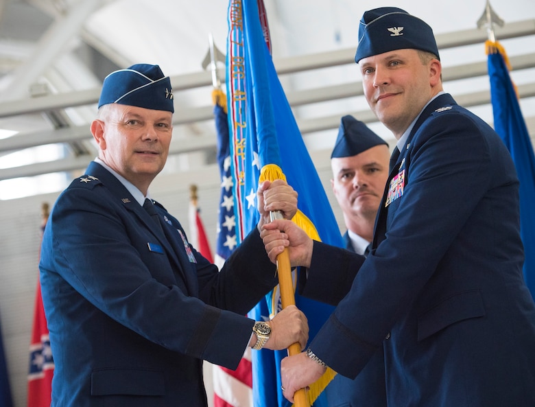 Col. David Abba accepts the 53rd Wing guidon from Maj. Gen. Glen VanHerck, Air Force Warfare Center commander, during a change of command ceremony June 20 at Eglin Air Force Base, Fla. The acceptance of the guidon signifies Abba’s command of the wing. Prior to his current assignment, Abba commanded the 3rd Operations Group at Joint Base Elmendorf-Richardson, Alaska. (U.S. Air Force photo/Ilka Cole)

