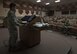 U.S. Air Force Airman 1st Class Anthony Ohara, a 35th Operations Support Squadron weather forecaster, gives a mass briefing on the current climate happenings during RED FLAG-Alaska 17-2 at Eielson Air Force Base, Alaska, June 16, 2017. During the exercise, Ohara and his coworker, Senior Airman Joseph Goebel, a 35th OSS weather forecaster, briefed participants of RF-A 17-2 from both Eielson AFB and Joint Base Elmendorf-Richardson, Alaska, using video calls. (U.S. Air Force photo by Airman 1st Class Sadie Colbert)