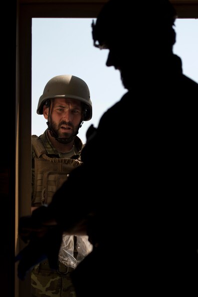 Army of the Czech Republic Sgt. 1st Class Milan Pagurko, explosive ordnance disposal member, waits outside a room to collect evidence after a controlled discharge of a mock improvised explosive device during the second annual multilateral IED Rodeo at Spangdahlem Air Base, Germany, June 15, 2017. The five day event allowed for multiple NATO militaries to work closely with one another while practicing and showcasing their EOD skills. (U.S. Air Force photo by Senior Airman Preston Cherry)