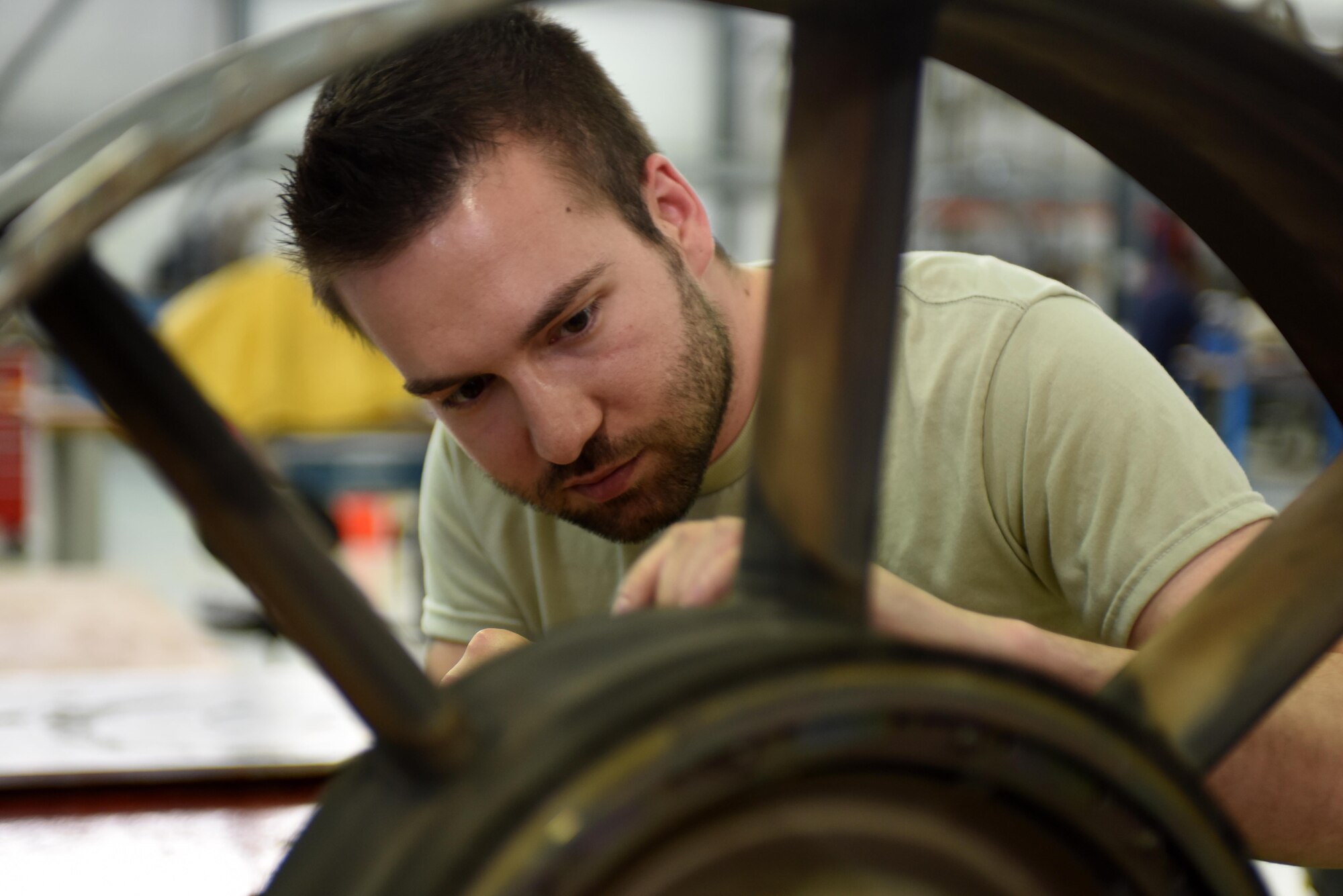 An Airman assigned to the 48th Component Maintenance Squadron inspects a turbine exhaust case at Royal Air Force Lakenheath, England, June 13. Part of the 48th CMS’s responsibilities include the routine maintenance of F-15 engines. (U.S. Air Force photo/Airman 1st Class Eli Chevalier)