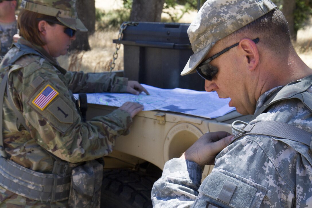 U.S. Army Maj. Dan Pupek, an Observer Controller Trainer (OCT) from the 3rd of the 290th Regiment, radios into the main Head Quarters during the 91st Training Division’s Warrior Exercise on Fort Hunter Liggett, Calif. June 15, 2017. More than 3000 U.S. Army Reserve Soldiers are participating in the 91st Training Division’s Warrior Exercise 91-17-03 at Fort Hunter Liggett, California; the Warrior Exercise is a large scale collective training platform to generate capable, lethal and combat ready forces. (Photo by Spc. Eric Unwin/released)