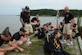 U.S. Army Soldiers assigned to the 74th Engineer Dive Detachment, 92nd Engineer Battalion, review what to look for when inspecting the piers at Third Port during a diving mission at Joint Base Langley-Eustis, Va., June 20, 2017. The divers regularly inspect the piers to determine if repairs are needed to keep the port operational. (U.S. Air Force photo/Airman 1st Class Kaylee Dubois)