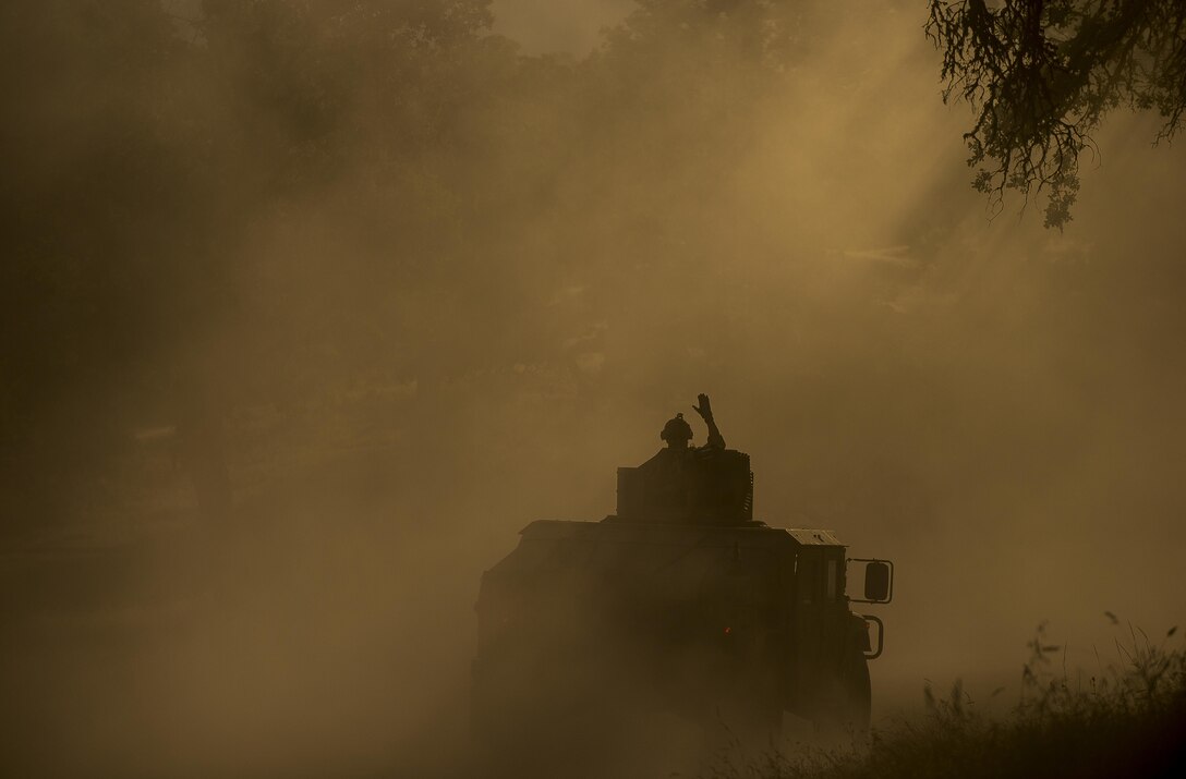 U.S. Army Reserve Soldiers from the 339th Military Police Company (Combat Support), headquartered in Davenport, Iowa, train on route reconnaissance at a Warrior Exercise (WAREX) through the dusty trails of Fort Hunter Liggett, California, June 20. The MP company's Soldiers had to relocate their tactical assembly areas in the field multiple times as they reconnoitered different areas of their operational environment, while fighting against temperatures reaching 100-plus degrees daily. (U.S. Army Reserve photo by Master Sgt. Michel Sauret)