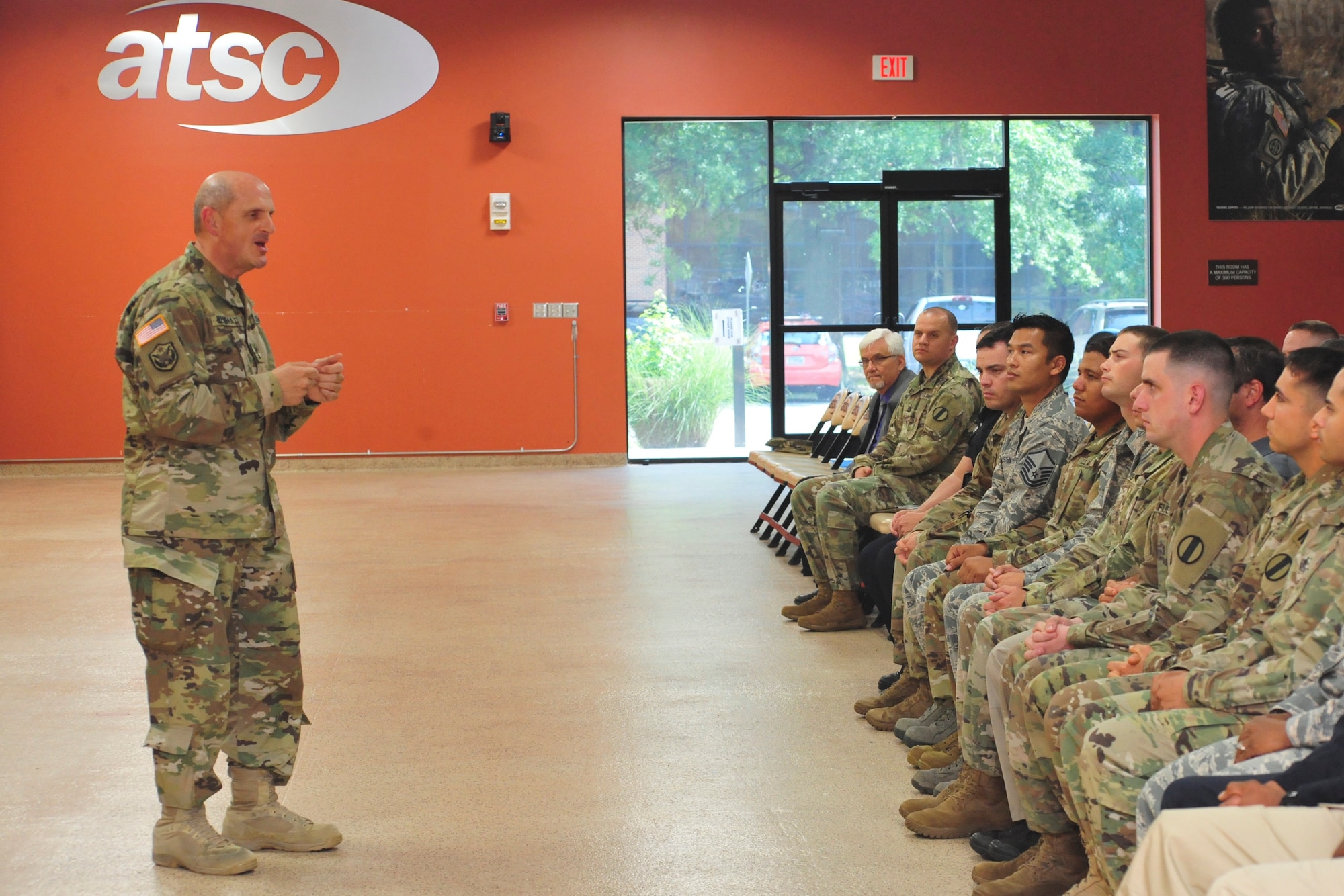 U.S. Army Maj. Gen. Paul Benenati, U.S. Army Training and Doctrine Command deputy chief of staff, speaks to the graduates of the Domestic Violence Intervention Training course about understanding the dynamics of victims and abusers, during a graduation ceremony at Joint Base Langley-Eustis, Va., June 16, 2017. Benenati reminded the class to pay attention to details when responding to domestic violence situations
(U.S. Air Force photo/Angela D. Watson)
