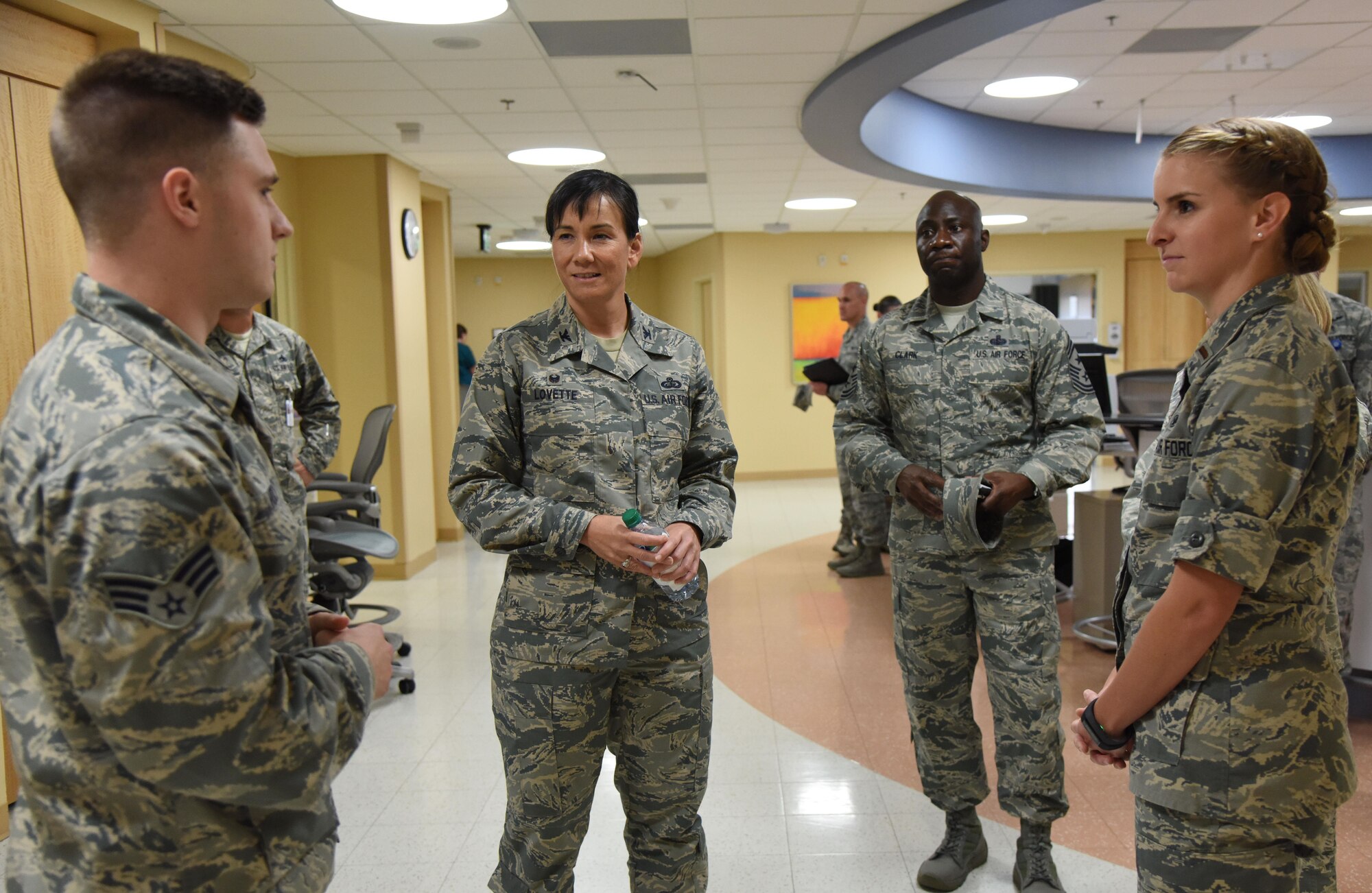 Senior Airman Graham Hoch, 81st Inpatient Operations Squadron aerospace medical technician, briefs Col. Debra Lovette, 81st Training Wing commander, on squadron capabilities during an 81st Medical Group orientation tour in the Keesler Medical Center June 16, 2017, on Keesler Air Force Base, Miss. The purpose of the tour was to familiarize Lovette with the group’s mission, operations and personnel. (U.S. Air Force photo by Kemberly Groue)