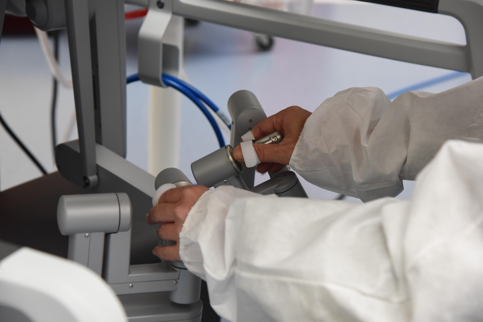 Col. Debra Lovette, 81st Training Wing commander, operates a robotics surgical system inside the robotics surgery clinic during an 81st Medical Group orientation tour in the Keesler Medical Center June 16, 2017, on Keesler Air Force Base, Miss. The purpose of the tour was to familiarize Lovette with the group’s mission, operations and personnel. (U.S. Air Force photo by Kemberly Groue)