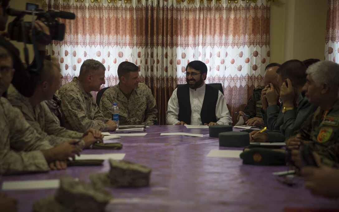 Governor Hayatullah Hayat, center-right, the governor of Helmand Province, and Lt. Gen. William Beydler, center-left, the commanding general of Marine Corps Forces Central Command, speak during a key leader engagement at Bost Airfield, Afghanistan, June 18, 2017. Beydler met with key Afghan National Defense Security Force personnel stationed in Helmand Province while receiving a first-hand look at Task Force Southwest’s current mission of training, advising and assisting their Afghan counterparts. (U.S. Marine Corps photo by Sgt. Justin T. Updegraff)