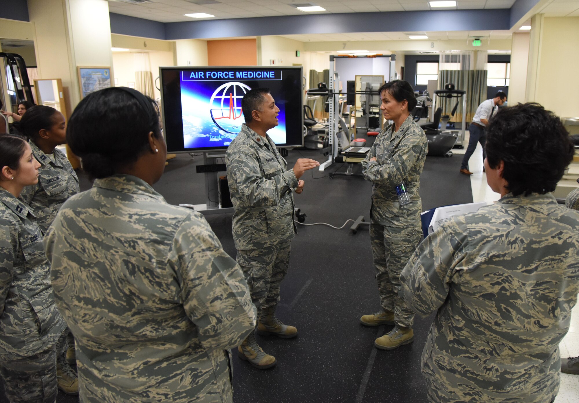 Maj. Jeremiah Samson, 81st Surgical Operations Squadron surgical services flight commander, briefs Col. Debra Lovette, 81st Training Wing commander, on physical therapy capabilities and procedures during an 81st Medical Group orientation tour in the Keesler Medical Center June 16, 2017, on Keesler Air Force Base, Miss. The purpose of the tour was to familiarize Lovette with the group’s mission, operations and personnel. (U.S. Air Force photo by Kemberly Groue)