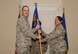 U.S. Air Force Lt. Col. Marquita Price, 20th Medical Operations Squadron (MDOS) commander, receives the 20th MDOS guidon from Col. Brian Wyrick, 20th Medical Group commander, during a change of command ceremony at Shaw Air Force Base, S.C., June 16, 2017. Price was the junior nurse executive fellow at the Office of the Surgeon General prior to her assignment at Shaw. (U.S. Air Force photo by Airman 1st Class Kathryn R.C. Reaves)