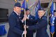 Col. Toby Doran, 50th Operations Group commander, presents the guidon to Lt. Col. Armon Lansing, 4th Space Operations Squadron incoming commander, during the 4 SOPS change of command ceremony at Schriever Air Force Base, Colorado, Tuesday, June 13, 2017. Lansing assumed command from Lt. Col. Sherman Johns who is transitioning to the National Space Defense Center. (U.S. Air Force photo/Dennis Rogers)