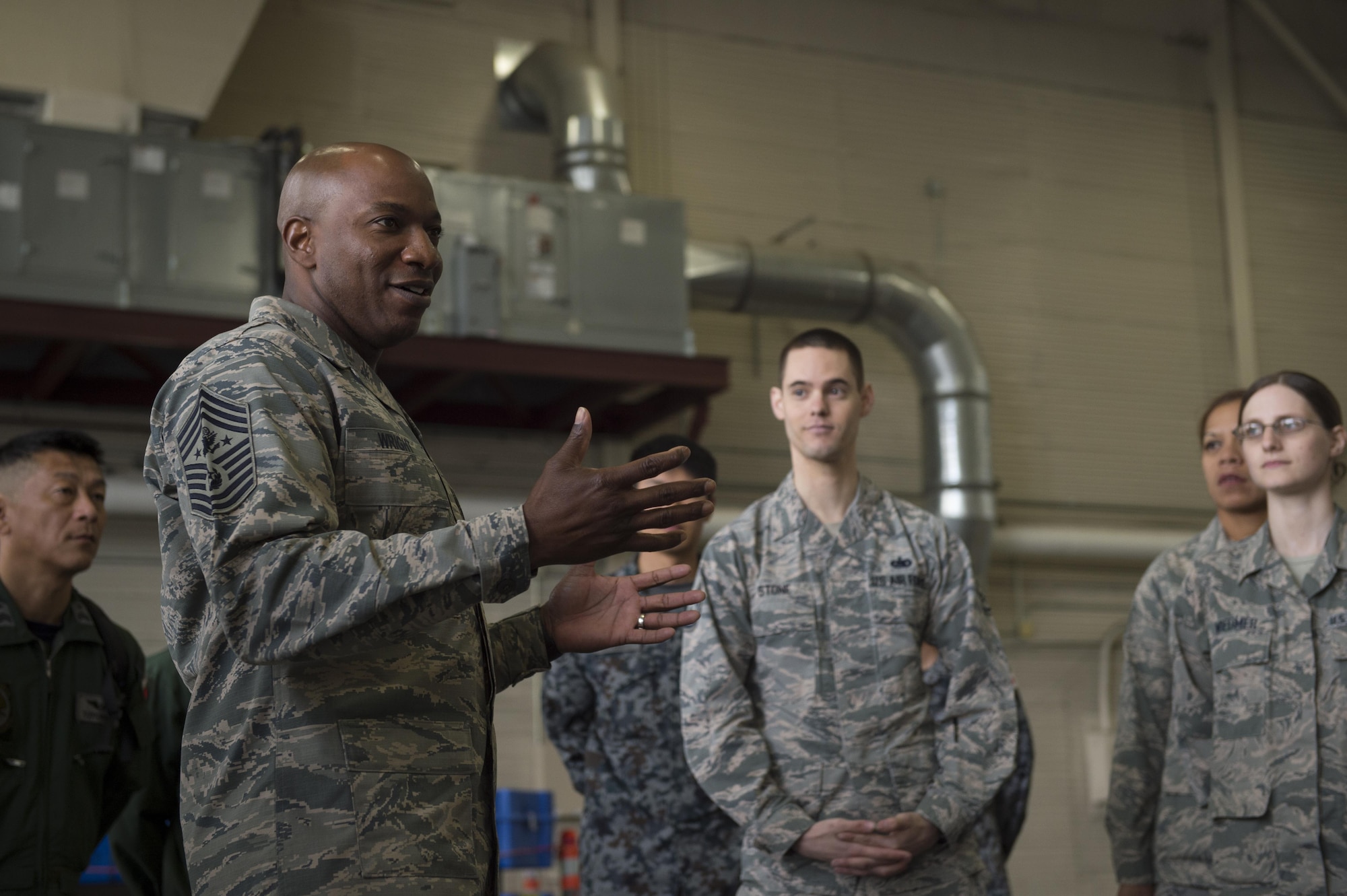 Chief Master Sgt. of the Air Force Kaleth O. Wright talks to a group of American and Japanese Airmen about resiliency at Joint Base Elmendorf-Richardson’s Hangar 4, June 19, 2017. The chief master sergeant of the Air Force, the Japan Air Self-Defense Force senior enlisted advisor, and other senior enlisted leaders visited Joint Base Elmendorf-Richardson, Alaska, as part of an international key-leader engagement. 