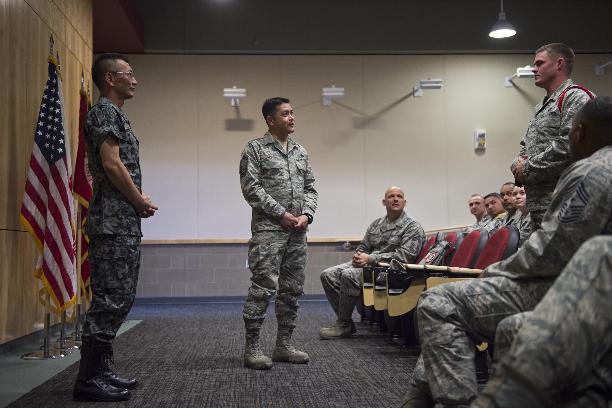 Warrant Officer Katsumi Yamazaki, senior enlisted advisor of the Japan Air Self-Defense Force, answers a question from an Airman Leadership School student at the Professional Military Education Center at Joint Base Elmendorf-Richardson, Alaska, June 19, 2017. The chief master sergeant of the Air Force, the Japan Air Self-Defense Force senior enlisted advisor, and other senior enlisted leaders visited Joint Base Elmendorf-Richardson, Alaska, as part of an international key-leader engagement.
