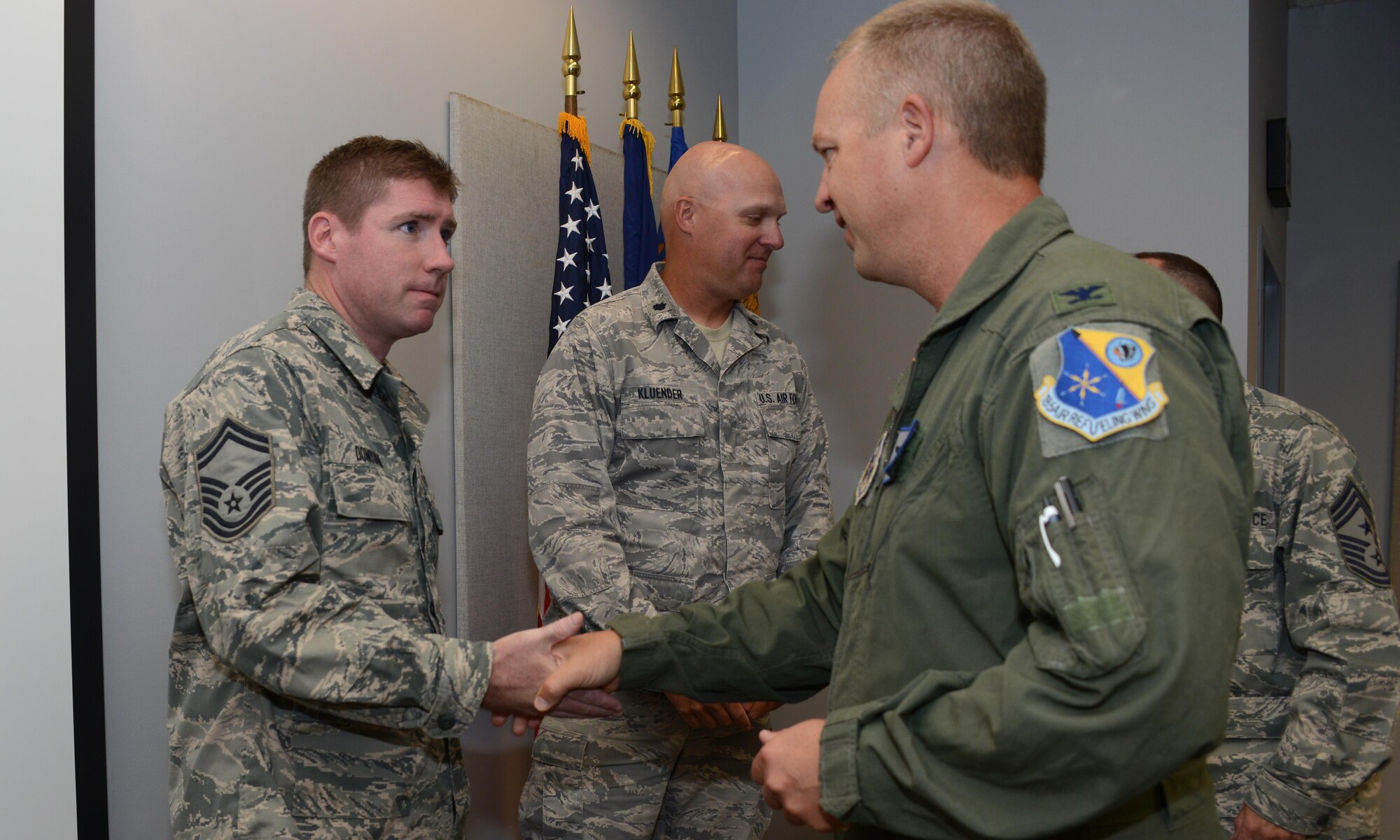 185th Air Refueling Wing Commander Col. Larry Christensen presents Senior Master Sgt. Joe Donovan of the 185th Financial Management office with Commanders coin at the Sioux City, Iowa Air National Guard base on June 21, 2017. Donovan and the rest of the Financial Management office were given coins in recognition of their receiving two top financial management awards for achievement and mission impact. 
U.S. Air National Guard photo by Master Sgt. Vincent De Groot/185ARW Wing PA 