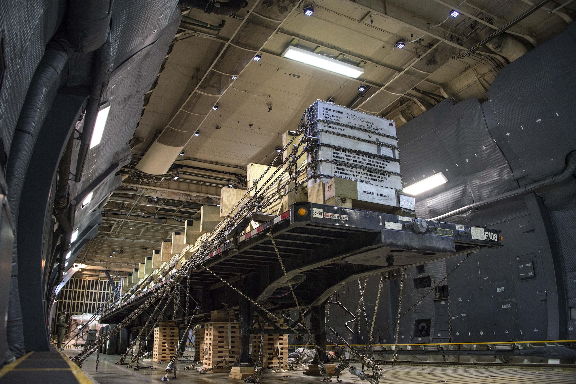 A U.S. Navy propulsion shaft is secured for transportation to the Pacific theater in a C-5M Super Galaxy at Travis Air Force Base, Calif., June 9, 2017.  As the largest aircraft in the U.S. Air Force’s inventory, the C-5M Super Galaxy serves as mobility air forces primary strategic airlift platform for transporting oversized and unconventional cargo. (U.S. Air Force photo by Staff Sgt. Charles Rivezzo)  