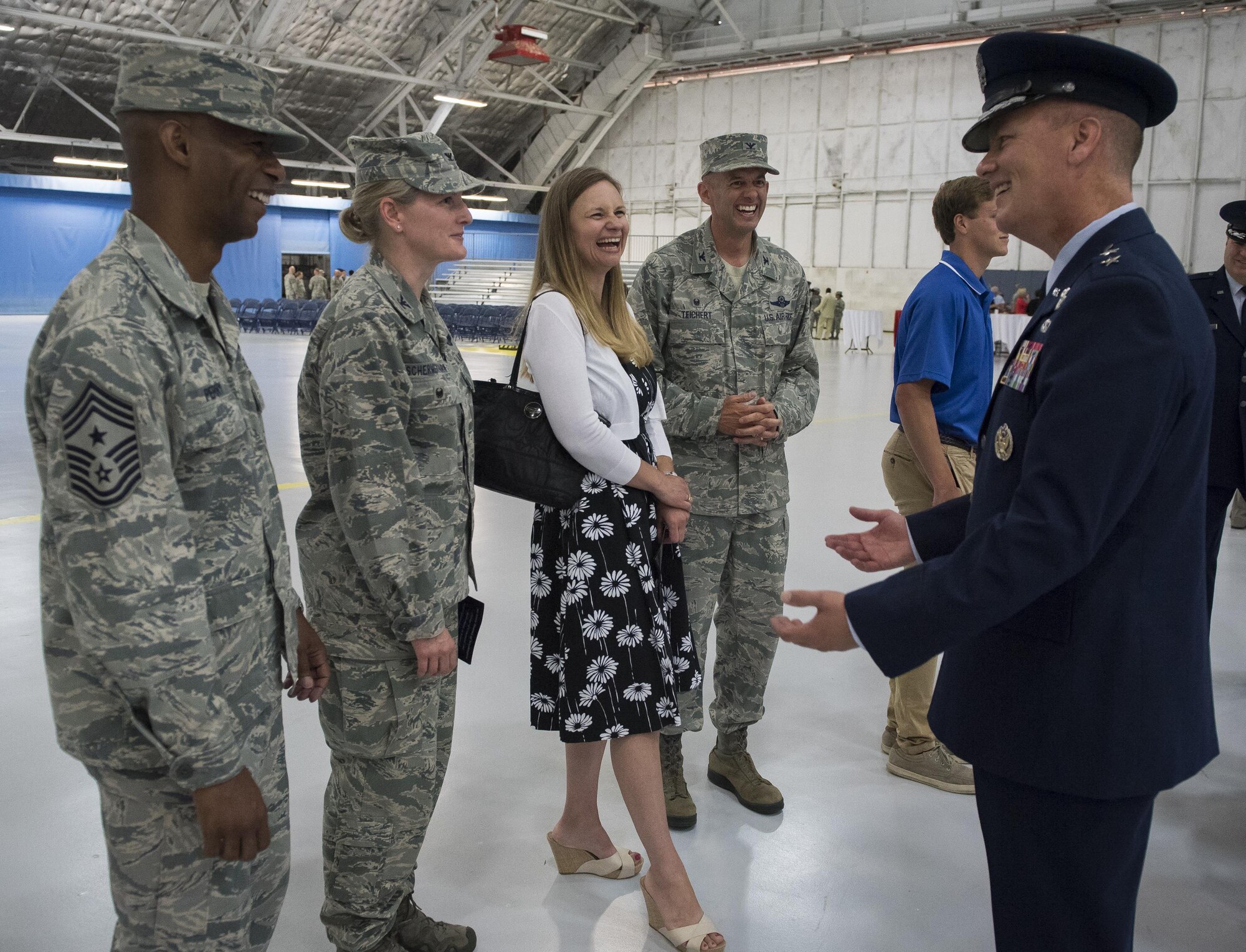 Maj. Gen. James Jacobson (right) talks with the 11th Wing Commander Col. E. John Teichert and members of the 11th Wing Command staff after assuming  command of the Air Force District of Washington during a ceremony on Joint Base Andrews, Md. June 20, 2017. Air Force Vice Chief of Staff Gen. Stephen Wilson (left) presided over the ceremony where Maj. Gen. Darryl Burke relinquished command to Jacobson. (U.S. Air Force photo/Jim Varhegyi)(released)