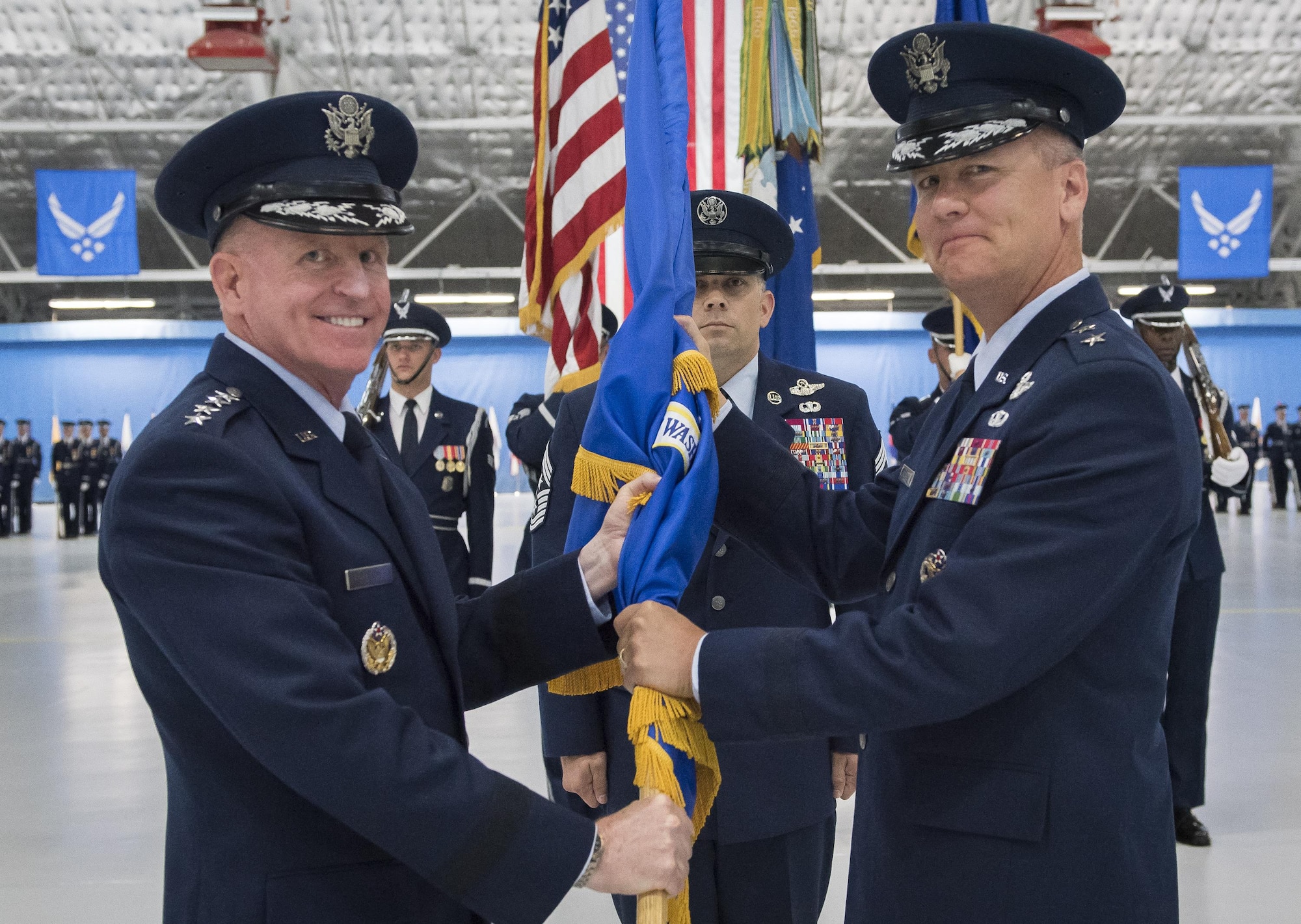 Maj. Gen. James Jacobson (right) assumes  command of the Air Force District of Washington during a ceremony on Joint Base Andrews, Md. June 20, 2017. Air Force Vice Chief of Staff Gen. Stephen Wilson (left) presided over the ceremony where Maj. Gen. Darryl Burke relinquished command to Jacobson. (U.S. Air Force photo/Jim Varhegyi)(released)