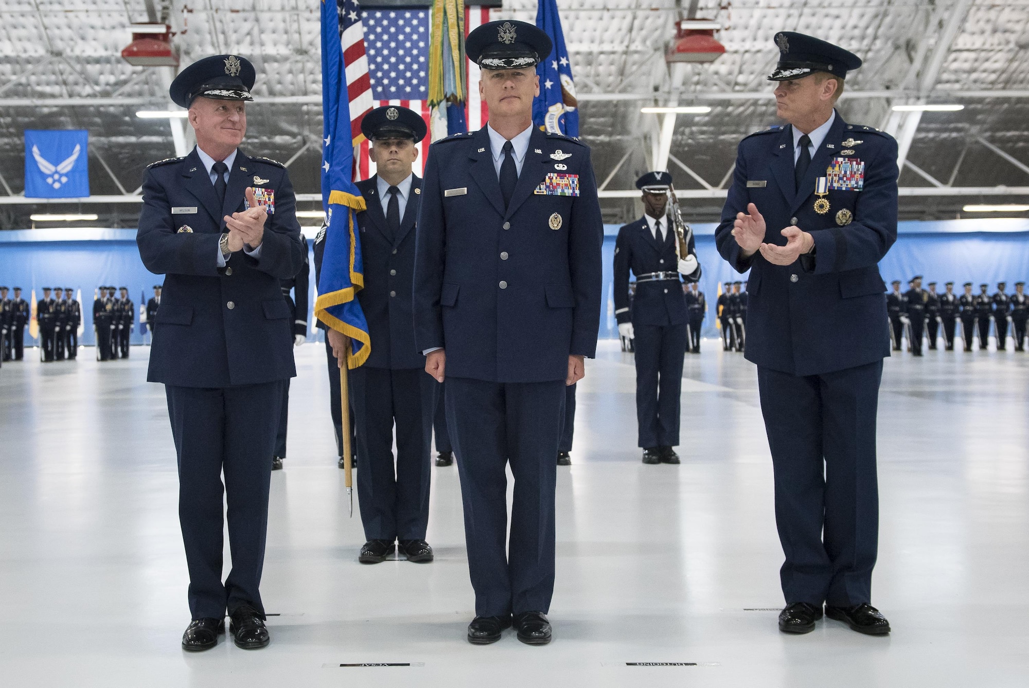 Maj. Gen. James Jacobson (center) assumes  command of the Air Force District of Washington during a ceremony on Joint Base Andrews, Md. June 20, 2017. Air Force Vice Chief of Staff Gen. Stephen Wilson (left) presided over the ceremony where Maj. Gen. Darryl Burke relinquished command to Jacobson. (U.S. Air Force photo/Jim Varhegyi)(released)