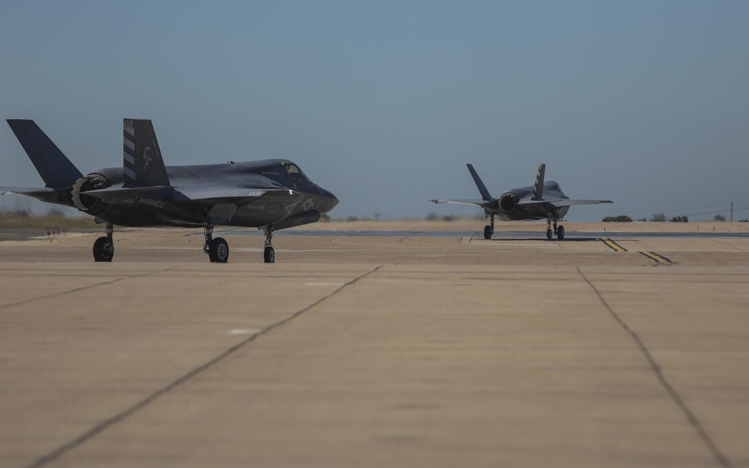 Two F-35B Lightning II with Marine Fighter Attack Squadron 211 taxi to the runway during the Marine Division Tactics Course at Marine Corps Air Station Miramar, Calif., June 16. This course gives pilots air-to-air combat experience and the tools to train Marines in their squadrons on the latest tactics. (U.S. Marine Corps photo by Sgt. Kimberlyn Adams/Released)
