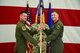 Lt. Col. Michael Blauser, 6th Weapons Squadron commander, assumes command of the squadron from Col. Michael Drowley, US Air Force Weapons School commandant, June 20, 2017, at Nellis Air Force Base, Nev. The 6th WPS was inactivated more than 70 years ago due to force-wide budget cuts. (U.S. Air Force photo by Airman 1st Class Andrew D. Sarver/Released)