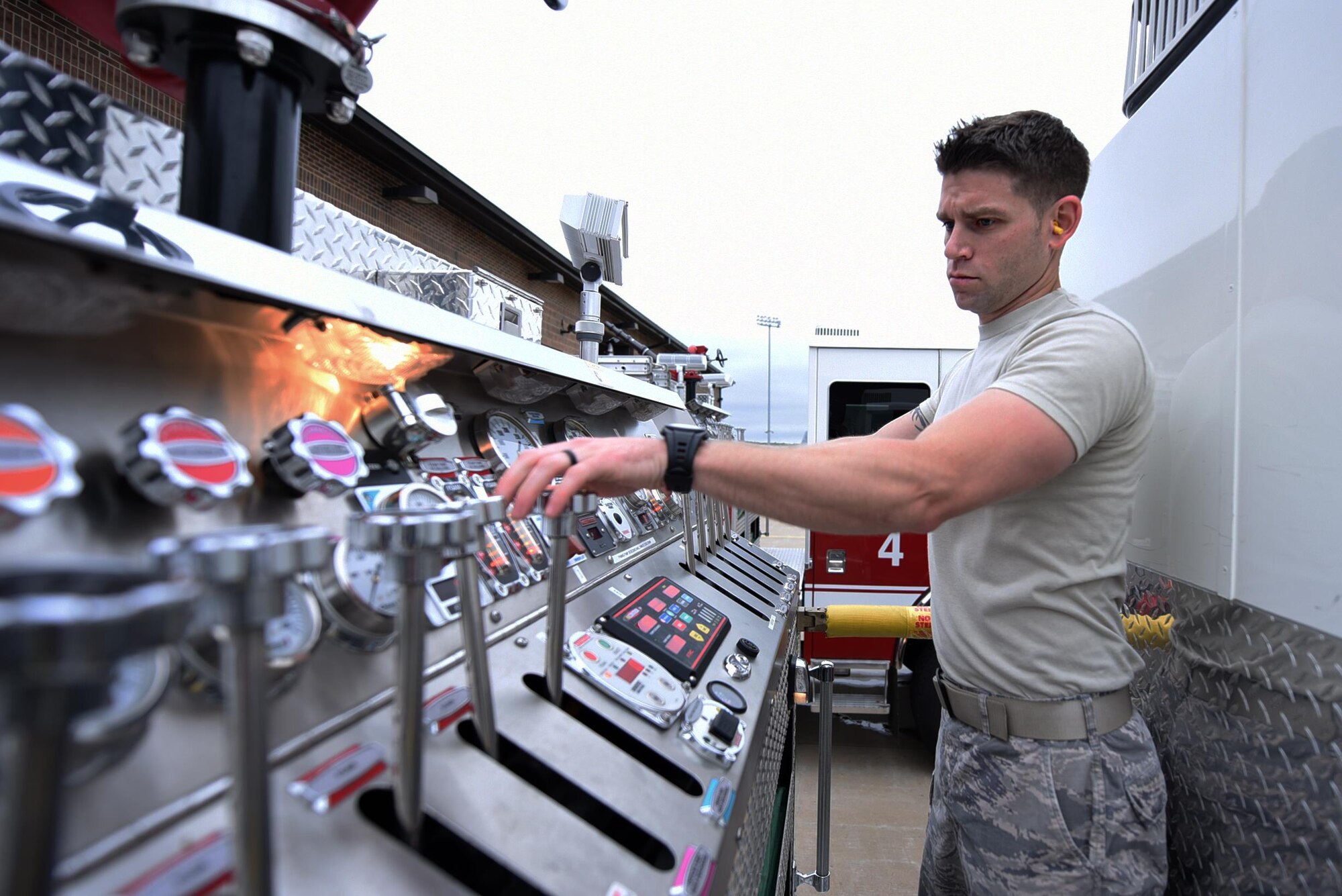 Airman 1st Class Nicholas Sands, 19th Civil Engineer Squadron Fire Department firefighter, ensures all firetruck components are operational June 13, 2017, at Little Rock Air Force Base, Ark. Little Rock AFB firefighters perform weekly inspection checks on all equipment and vehicles to ensure they are fully operable. (U.S. Air Force photo Airman 1st Class Kevin Sommer Giron)