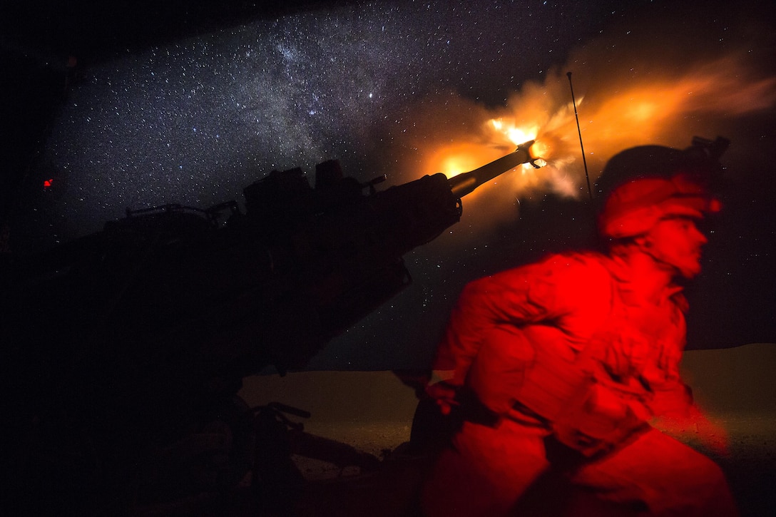 A U.S. Marine fires an M777-A2 Howitzer in the early morning in Syria, June 3, 2017. They have been conducting 24-hour all-weather fire support for the Coalition’s local partners, the Syrian Democratic Forces, as part of Combined Joint Task Force-Operation Inherent Resolve. CJTF-OIR is the global coalition to defeat ISIS in Iraq and Syria.